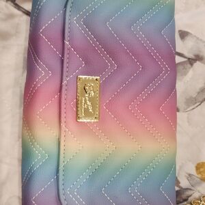 Crossbody clutch bag with change purse. No tags but never used.